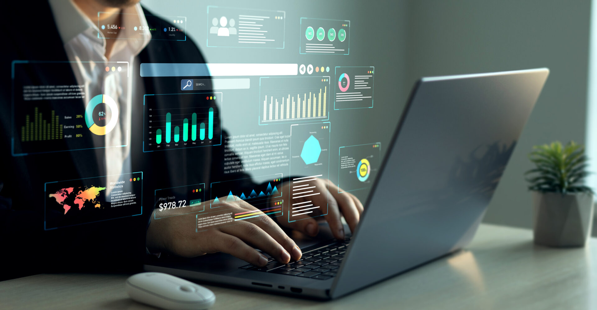 Person analyzing data on laptop screen.