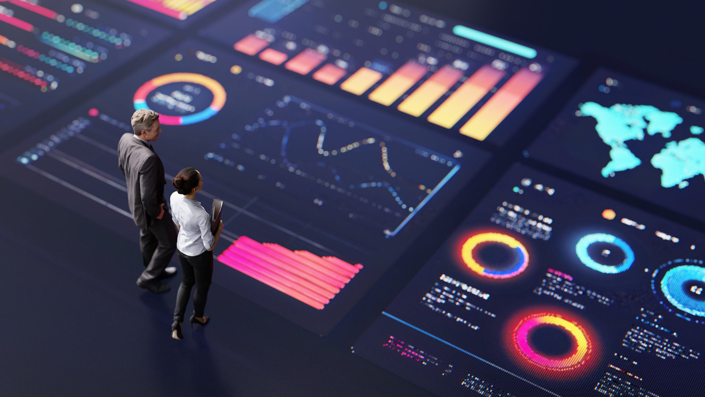People analyzing digital data visualization screens.
